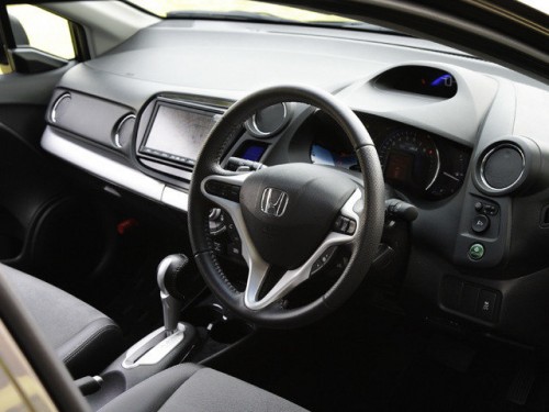 Характеристики автомобиля Honda Insight 1.5 Exclusive XG (05.2013 - 03.2014): фото, вместимость, скорость, двигатель, топливо, масса, отзывы