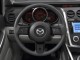 Характеристики автомобиля Mazda CX-7 2.3 AT Sport (04.2006 - 08.2009): фото, вместимость, скорость, двигатель, топливо, масса, отзывы