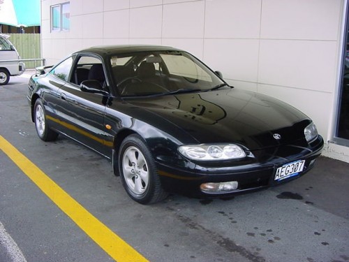 Характеристики автомобиля Mazda MX-6 2.0 V6 DOHC special package (06.1994 - 12.1995): фото, вместимость, скорость, двигатель, топливо, масса, отзывы