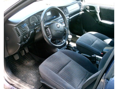 Характеристики автомобиля Opel Vectra 1.8 AT GL (11.1995 - 05.2000): фото, вместимость, скорость, двигатель, топливо, масса, отзывы