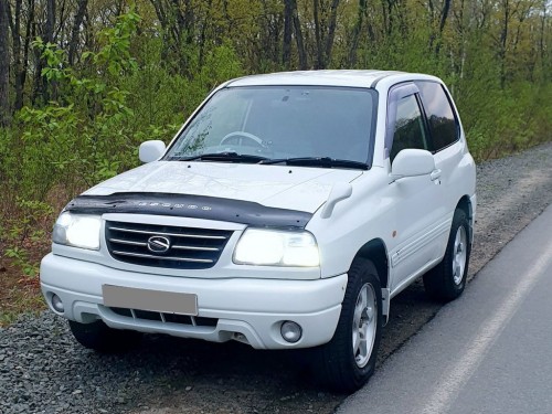 Характеристики автомобиля Suzuki Escudo 2.0 (12.2000 - 10.2002): фото, вместимость, скорость, двигатель, топливо, масса, отзывы
