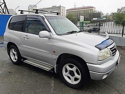 Характеристики автомобиля Suzuki Escudo 1.6 (04.2000 - 11.2000): фото, вместимость, скорость, двигатель, топливо, масса, отзывы
